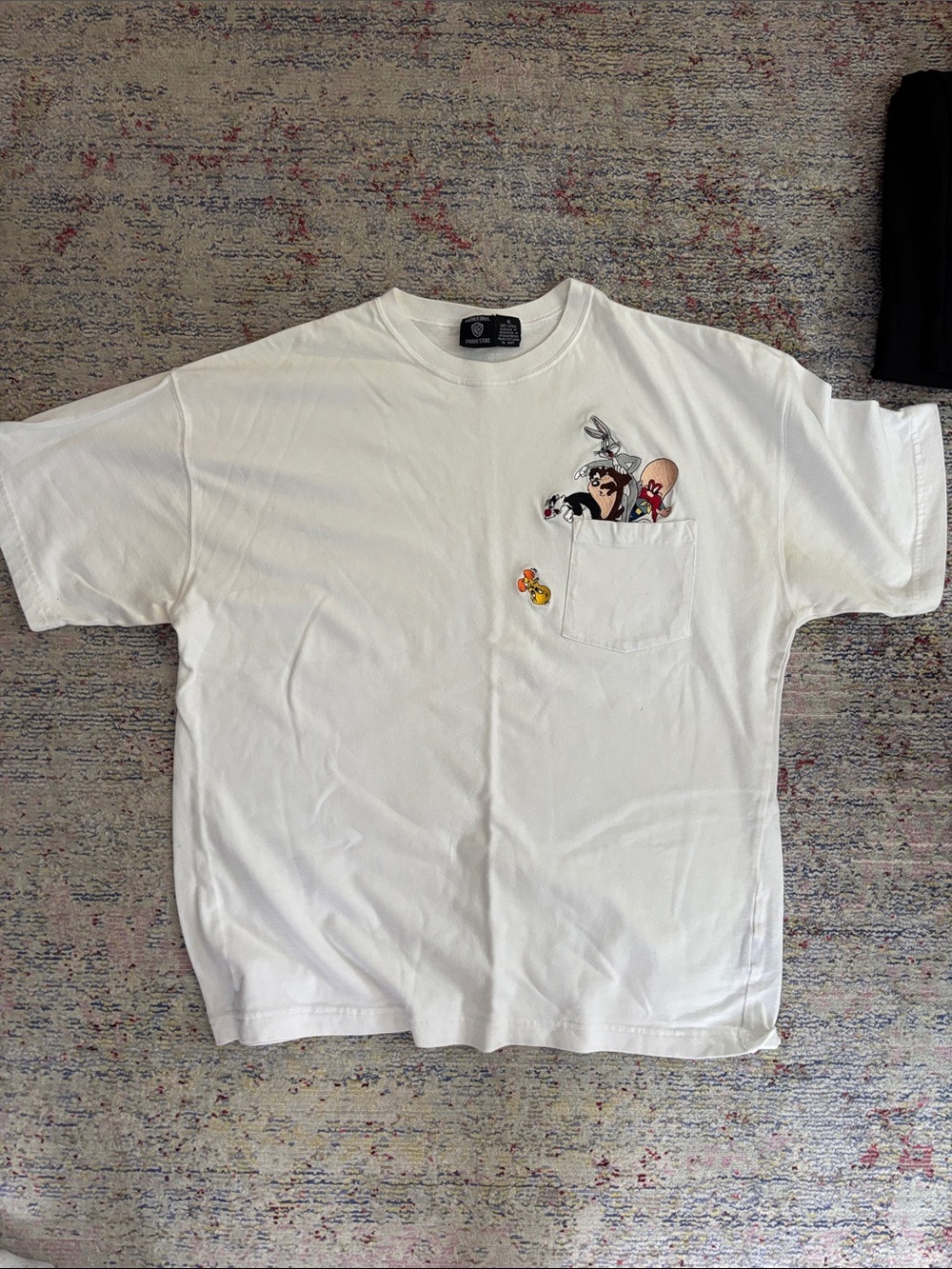 Warner Bros. White Short Sleeve Tee with Looney Tunes Pocket Graphic